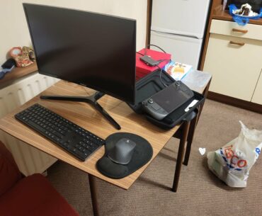 Armchair + 30+ year old kitchen table = serviceable workstation