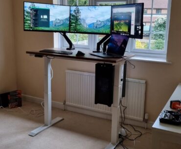 The accidental comedy of mounting a gaming PC to my standing desk. Note the radiator immediately behind, and the desk's inability to go against the wall. The 〰️wobble〰️ was horrific.