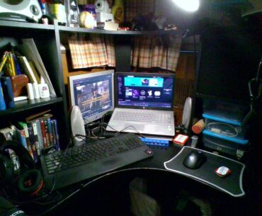 Old photo of my setup from around 2018-ish. Found on a random SD card that happens to be the same one on top of the keyboard in the photo. Current setup is a proper, decent battlestation, thankfully.