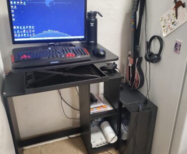 My shitty battlestation (I live in a 500 sq foot apartment with a partner and have to make do)