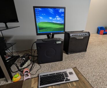 Windows XP Home with one of those shitty trackpad keyboard combos